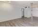 Spacious living room with neutral tones and updated flooring at 11149 W Palm Ridge Dr, Sun City, AZ 85351