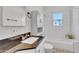 Nicely updated bathroom with decorative tile floors, subway tile surround, and granite counters at 1306 E Fillmore St, Phoenix, AZ 85006