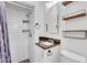 Bathroom with new tiling, updated fixtures, and a new vanity at 1306 E Fillmore St, Phoenix, AZ 85006