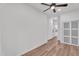 Empty bedroom with ceiling fan, showing closet doors and doorway at 1306 E Fillmore St, Phoenix, AZ 85006