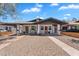 Charming duplex with individual entrances, desert landscaping, and a shared driveway at 1306 E Fillmore St, Phoenix, AZ 85006