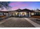 Charming duplex with individual entrances, desert landscaping, and a shared driveway at 1306 E Fillmore St, Phoenix, AZ 85006
