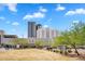 The modern Banner University Medical Center complex with green landscape and surface parking in the foreground at 1306 E Fillmore St, Phoenix, AZ 85006