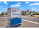 A Banner University Medicine sign with directional arrows in front of the main hospital complex at 1306 E Fillmore St, Phoenix, AZ 85006