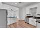 Charming kitchen with stainless steel appliances and hardwood floors at 1306 E Fillmore St, Phoenix, AZ 85006