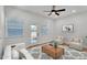 Bright living room with stylish furnishings, including a sofa, chairs, and a modern coffee table at 1306 E Fillmore St, Phoenix, AZ 85006