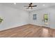 Sunlit room with ceiling fan and door to the outside at 1306 E Fillmore St, Phoenix, AZ 85006