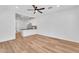 Bright, open living room with a view into the kitchen at 1306 E Fillmore St, Phoenix, AZ 85006