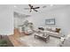 Bright, staged living room flowing to the kitchen with modern finishes at 1306 E Fillmore St, Phoenix, AZ 85006