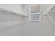 Spacious walk-in closet with ample storage space and built-in shelving at 1306 E Fillmore St, Phoenix, AZ 85006
