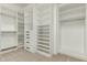 Organized walk-in closet with custom shelving, drawers, and ample storage space at 13204 W Palo Verde Dr, Litchfield Park, AZ 85340
