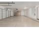 Spacious garage with ample storage and three garage doors at 13204 W Palo Verde Dr, Litchfield Park, AZ 85340
