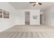 Spacious living room with ceiling fan and neutral carpet at 13204 W Palo Verde Dr, Litchfield Park, AZ 85340