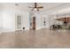 Expansive living area with hardwood-style flooring and versatile layout, great for entertaining and gatherings at 13204 W Palo Verde Dr, Litchfield Park, AZ 85340