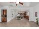 Open concept living room flows into a modern kitchen with a large island at 13204 W Palo Verde Dr, Litchfield Park, AZ 85340
