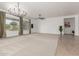 Expansive living room space, perfect for entertaining, with ample natural light from large windows at 13204 W Palo Verde Dr, Litchfield Park, AZ 85340