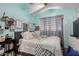 Stylish bedroom with a blend of decor and ample natural light at 136 W Brahman Blvd, San Tan Valley, AZ 85143