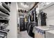 Walk-in closet with custom shelving and ample storage space for organization at 136 W Brahman Blvd, San Tan Valley, AZ 85143