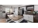 Modern kitchen with stainless steel appliances, granite countertops, and a large island at 136 W Brahman Blvd, San Tan Valley, AZ 85143