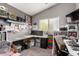 Well-lit office space with ample storage, shelving, and a comfortable work area at 136 W Brahman Blvd, San Tan Valley, AZ 85143