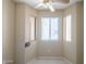 Bright den featuring a ceiling fan and natural light, a comfortable and functional space at 1506 N Oak St, Tempe, AZ 85288
