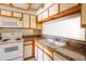 Functional kitchen featuring white appliances, ample counter space, and a bright, inviting atmosphere at 1506 N Oak St, Tempe, AZ 85288