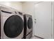 Laundry room with a Samsung washer and dryer at 16031 W Williams St, Goodyear, AZ 85338