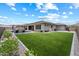Enjoy the expansive backyard with pool, seating areas, lush greenery, and mountain views at 16226 S 35Th Dr, Phoenix, AZ 85045