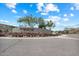 Promontory at Foothills West community entrance with beautiful landscaping and mountain views at 16226 S 35Th Dr, Phoenix, AZ 85045