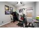 Home exercise room with fitness equipment including a treadmill and Bowflex machine at 16226 S 35Th Dr, Phoenix, AZ 85045