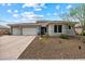 Charming single-story home with a three-car garage and low-maintenance desert landscaping at 16226 S 35Th Dr, Phoenix, AZ 85045