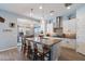 Bright and open kitchen with white cabinets, large island, and seating, ideal for Gathering gatherings at 16226 S 35Th Dr, Phoenix, AZ 85045