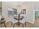 Dining room boasts modern chandelier and furniture set with an inviting, luxury ambiance at 18205 N 18Th St, Phoenix, AZ 85022