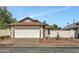 Charming single-Gathering home with a two-car garage and low maintenance desert landscaping at 18205 N 18Th St, Phoenix, AZ 85022