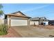 Charming single-Gathering home with a two-car garage and low maintenance desert landscaping at 18205 N 18Th St, Phoenix, AZ 85022