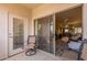 Spacious balcony with seating and views into the home's living area, ideal for indoor-outdoor living at 1941 S Pierpont Dr # 2073, Mesa, AZ 85206