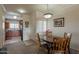 Dining room featuring wood table and chairs next to the entryway at 1941 S Pierpont Dr # 2073, Mesa, AZ 85206