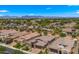 Wide aerial perspective of neighborhood homes boasting solar panels and well-kept landscaping at 19877 S 185Th Way, Queen Creek, AZ 85142