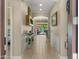 Inviting hallway with tiled floors that leads to an open living area and backyard at 19877 S 185Th Way, Queen Creek, AZ 85142