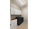 Functional laundry room featuring modern washer and dryer with lots of cabinet space at 19877 S 185Th Way, Queen Creek, AZ 85142