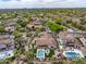 Wide aerial view of an estate home in a desert community, featuring desert landscaping at 20055 N 96Th Way, Scottsdale, AZ 85255