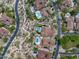 An aerial view of luxury desert homes, boasting landscaped yards and sparkling pools, set within a vibrant community at 20055 N 96Th Way, Scottsdale, AZ 85255