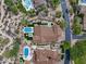 Straight down aerial view showcases estate home's outdoor space with pool and meticulous landscaping at 20055 N 96Th Way, Scottsdale, AZ 85255