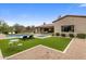 Backyard featuring a pool, spa, lush landscaping, and ample space for entertaining and relaxation at 20055 N 96Th Way, Scottsdale, AZ 85255