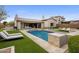 Resort-style backyard with pool, spa, outdoor kitchen, and covered patio, perfect for outdoor entertaining at 20055 N 96Th Way, Scottsdale, AZ 85255