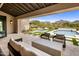 Inviting outdoor patio with mountain views, lush landscaping, pool, hot tub, and comfortable seating areas at 20055 N 96Th Way, Scottsdale, AZ 85255