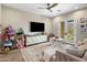 Cozy room with large windows, display cabinet and lots of room for toys at 20055 N 96Th Way, Scottsdale, AZ 85255