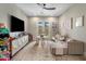 Light and airy room with large windows, play table and plenty of seating space at 20055 N 96Th Way, Scottsdale, AZ 85255