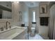 Bright bathroom featuring modern fixtures, white marble countertop, and neutral decor at 2020 W Union Hills Dr # 110, Phoenix, AZ 85027