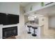 Cozy eat-in kitchen with stainless appliances, breakfast bar, and decorative hanging plants at 2020 W Union Hills Dr # 110, Phoenix, AZ 85027